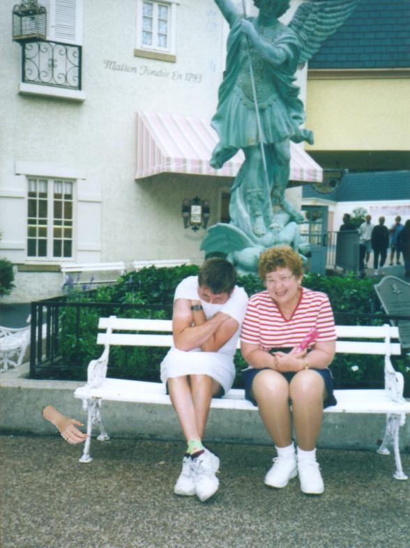 The giant green angel thinks Mommy is a flag that needs a flag pole...and tries to pole her